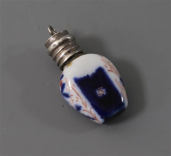 A late Victorian silver mounted ceramic scent bottle charm, 27mm.